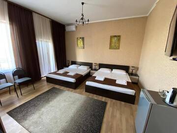 Фото номера Семейный номер с балконом Гостевой дом Skurcha Guest house г. Dacha 4