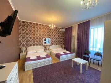 Фото номера Четырехместный номер с балконом Гостевой дом Skurcha Guest house г. Dacha 6